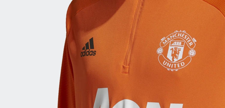 manchester-united-trainingspak-2021-oranje.jpg